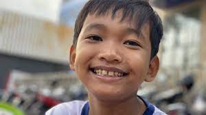 Hành động đẹp của cậu bé 10 tuổi ở góc đường An Dương Vương, quận 5 - Báo  Người lao động