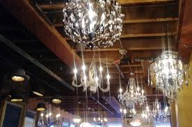 The Lighting Included Men S Hats As Fixtures Over The Bar And Crystal Chandeliers Through The Rest Of The Space Picture Of Hattery Stove Still Doylestown Tripadvisor