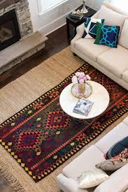 rug layering to add a pop of color
