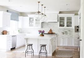 Reds, burgundy, oranges, yellows, olive green, ivory, turquoise, deep purple, brown. Kitchen Reno Transform A Tuscan Kitchen Into A Bright White Kitchen Home Bunch Interior Design Ideas