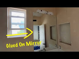 How To Remove Glued On Bath Mirror