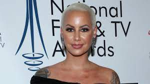 amber rose debuts face tattoos see