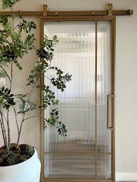 Gold Barn Doors With Fluted Glass