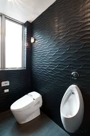 The Wall Tiles Lining The Toilet Ar