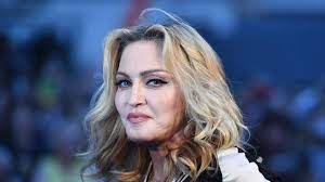 Currently, madonna resides in lisbon, portugal, with her adopted children from malawi. Madonna Facts Singer S Age Husband Children Net Worth And More Revealed Smooth