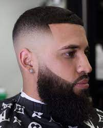 It is also possible to get creative bald fade haircuts with hair types such as curly, straight, wavy. Men S Skin Fade With Beard Skin Fade With Beard Fade Haircut With Beard Beard Haircut