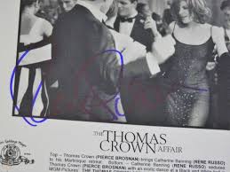 I an *still* looking for the b@d@$$ boots, skirt, and biker jacket she wore in the scene where she breaks into crown's townhouse to find the stolen painting! The Thomas Crown Affair Dual Signed Photo Pierce Brosnan And Rene Russo 1845822984