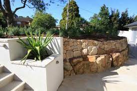White Render Retaining Wall With