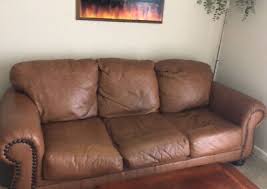 brown leather sofa and loveseat set