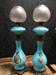 set of two antique blue glass oil lamps