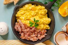 creamy scrambled eggs with ham and cheese