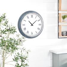 Litton Lane White Metal Wall Clock With