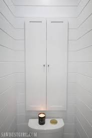 recessed wall cabinet for toilet paper