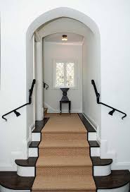 white staircase with black striped
