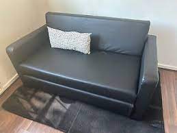 lucy 2 seater faux leather sofa bed