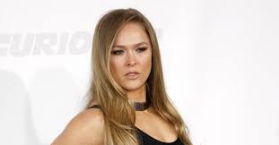 ronda rousey accuses wwe of holding her