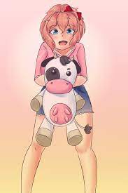 Sayori loves her cow plush! : r/DDLC