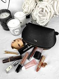 on the go makeup bag essentials from