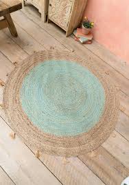 suru round jute rug with tels