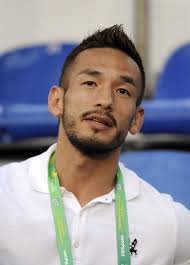 Hidetoshi Nakata looks on as he attends an Italy training session at Estadio Joao Havelange on June 12, 2013 in Rio de Janeiro, Brazil. - Hidetoshi%2BNakata%2BItaly%2BTraining%2BPress%2BConference%2BC-Tz5fsL4W2l