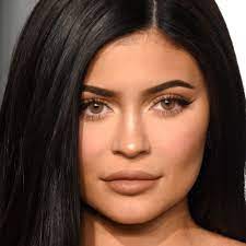 kylie jenner debuts neon yellow winged