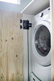 Change the set up of the washer and dryer. Hidden Washer And Dryer Cabinet A Beautiful Mess