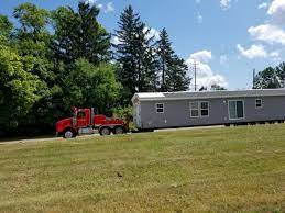 find mobile home movers and