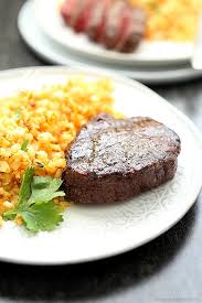 top sirloin steak on the grill with