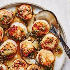 seared scallops with brown er and