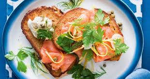 Smoked salmon breakfast bagel filled with cream cheese, fresh tomato, scrambled egg and smoked salmon and topped with fresh dill. Our Top 50 Smoked Salmon Recipes