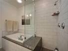 Small soaking tub shower combo