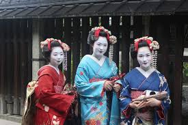 three geisha smiling