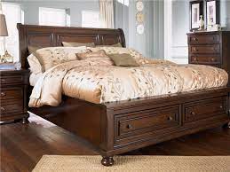 A handful of ashley's bedroom furniture sets include. Ashley Furniture Porter King Sleigh Bed With Storage Footboard Sam Levitz Furniture Sleigh Beds