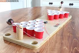 You can use any waterproof resin. Diy Mini Beer Pong Game Rogue Engineer