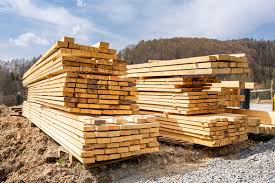 stack of wooden beams on construction