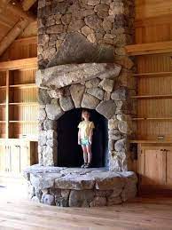 Arched Opening Fieldstone Fireplace