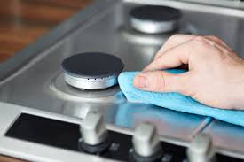 how to clean baked on grease on stove