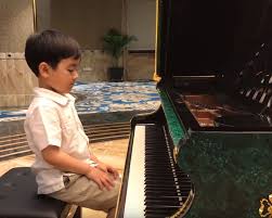 What makes a child prodigy? Little Boy Plays The Piano With Masterful Precision