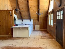 refinishing the cabin wood floors
