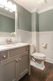 If your home is a craftsman, the wainscoting should be more of a shaker style, with straight lines and flat panels. Tranquil Bathroom Features Upper Walls Painted Gray Green And Lower Walls Clad In Board And Batten Lin Tranquil Bathroom Small Bathroom Remodel Bathroom Design
