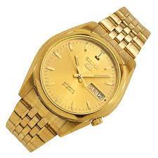 jewels gold tone gold dial watch snkl28