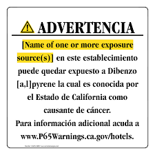 spanish prop 65 hotel warning sign