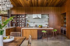 A rustic kitchen with oak cabinetry can be enhanced by the ambient lighting. New This Week 3 Knockout Kitchens With Natural Wood Cabinets