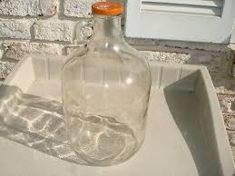 vintage 1 gallon glass jug with finger