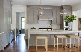 gray kitchen island with gold counter