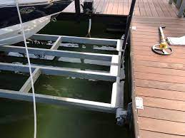covered single slip dock with lifts