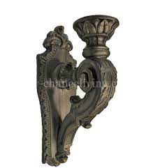If you plan to burn candles in the sconce, rather than have it serve decorative purposes only, the holder within the sconce is important. Decorative Wall Sconce Candle Holder With Back Plate Reilly Chance Collection