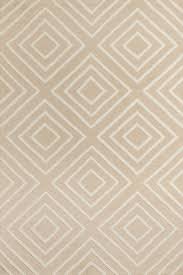 beige geometric hand tufted carpet