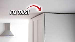 how to fix gap above cabinets without
