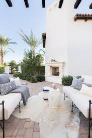 outdoor sofas with ivory cowhide rug